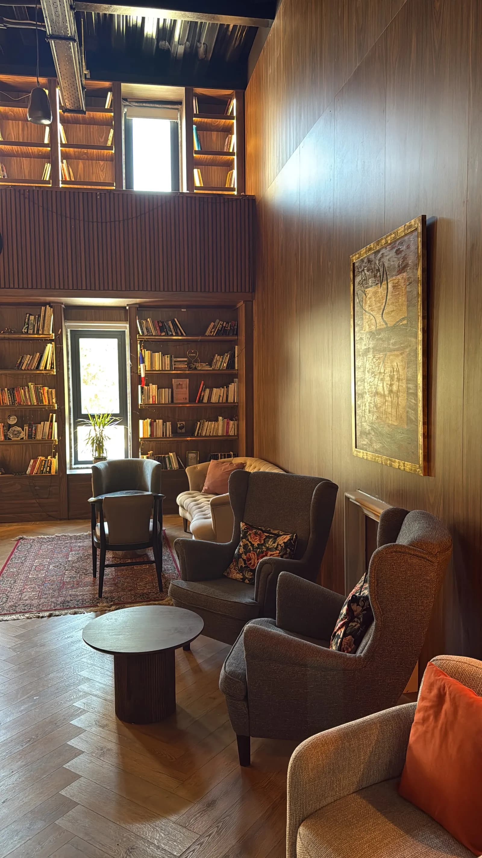 The library corner with floor-to-ceiling bookshelves