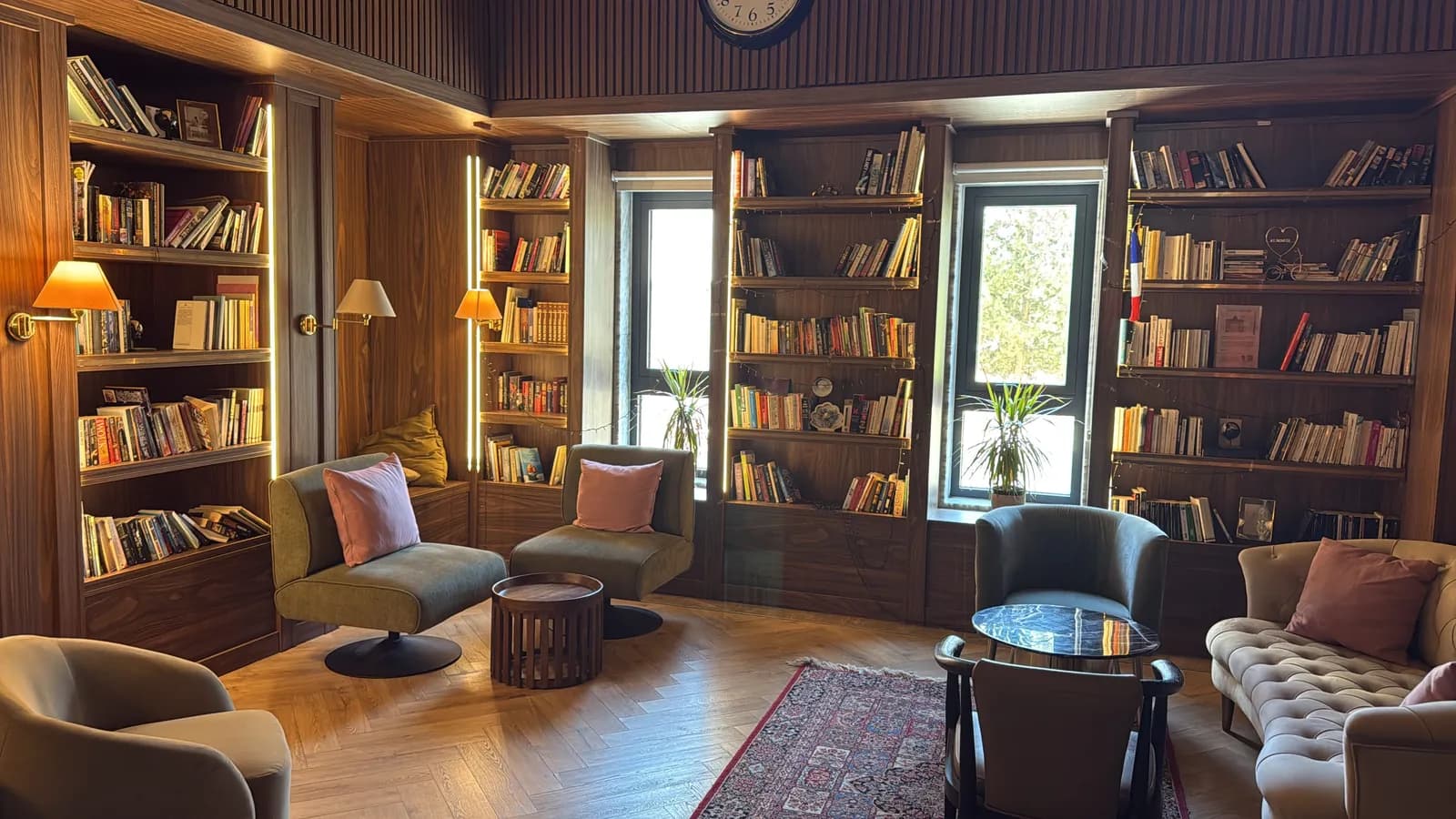 The reading room with armchairs and lamplight